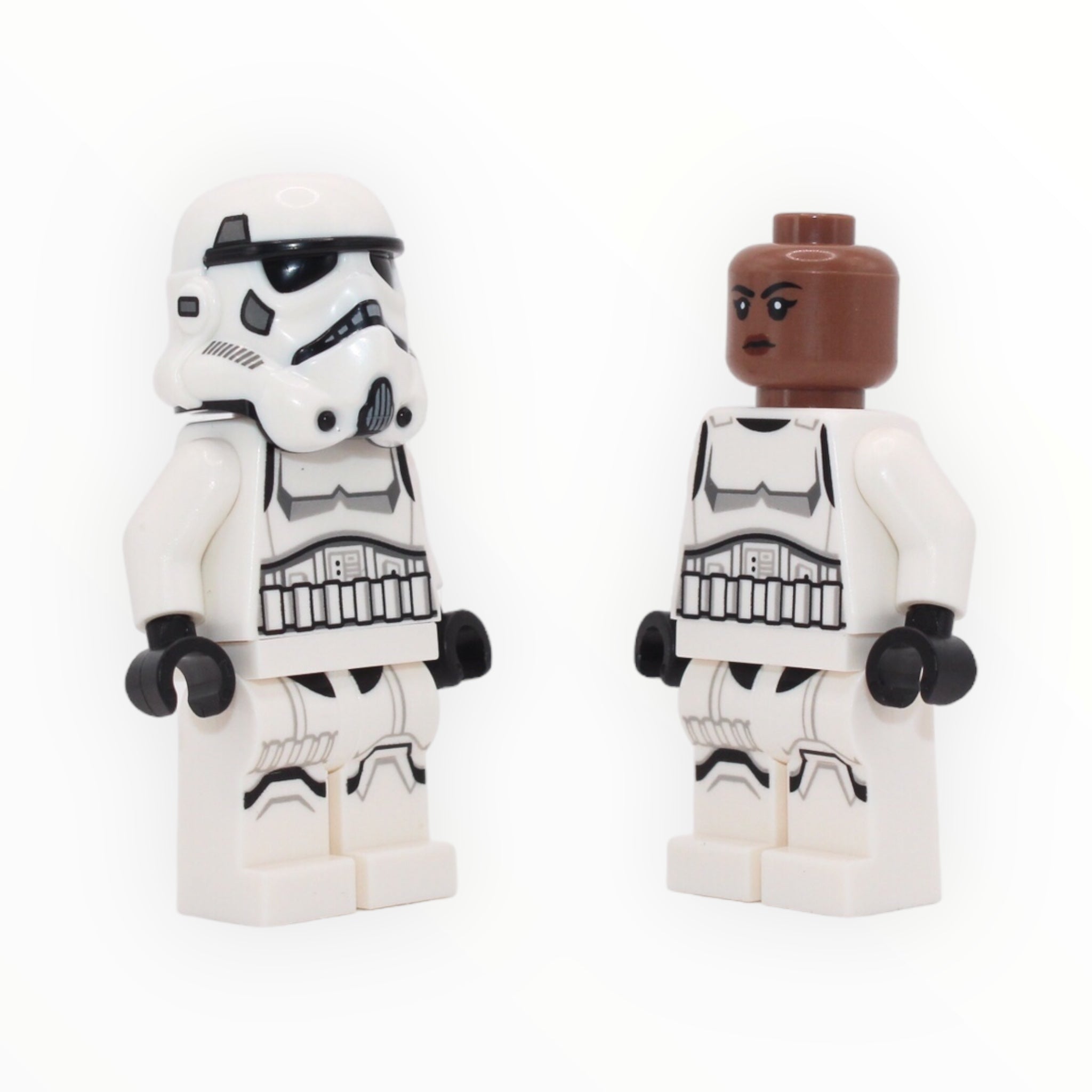 Stormtrooper (dual-molded helmet, detailed torso and legs, medium brown female head, 2024)