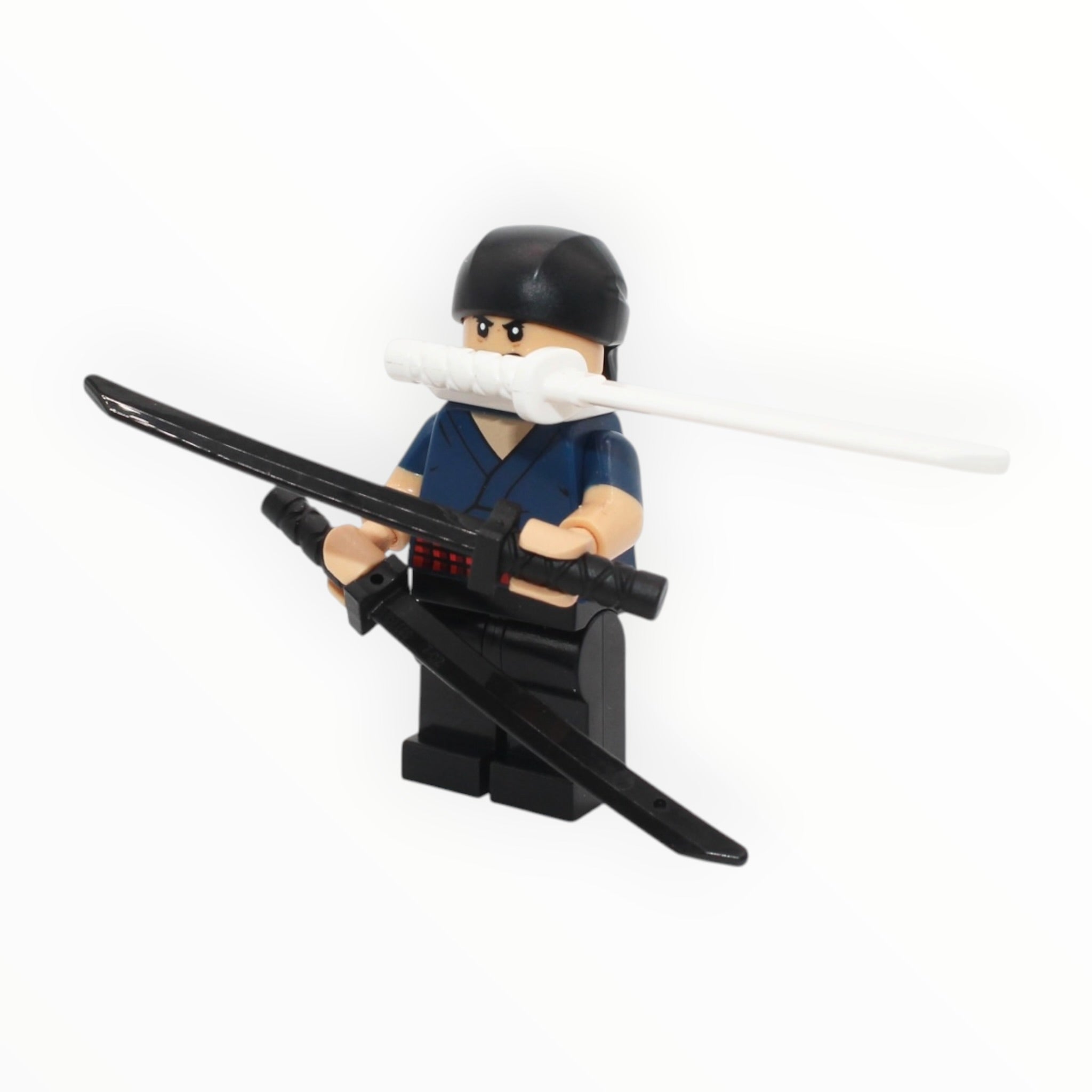 Roronoa Zoro (bandana, dark blue shirt, three swords, 2025)
