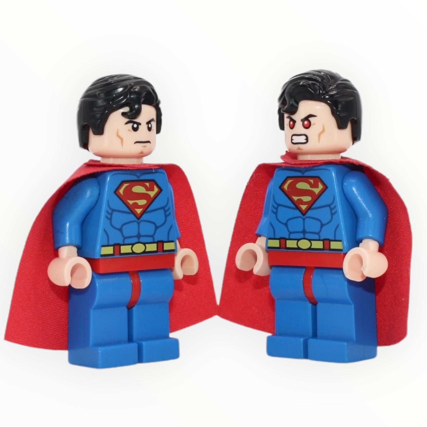 Superman (stiff cape, frown / red eyes)