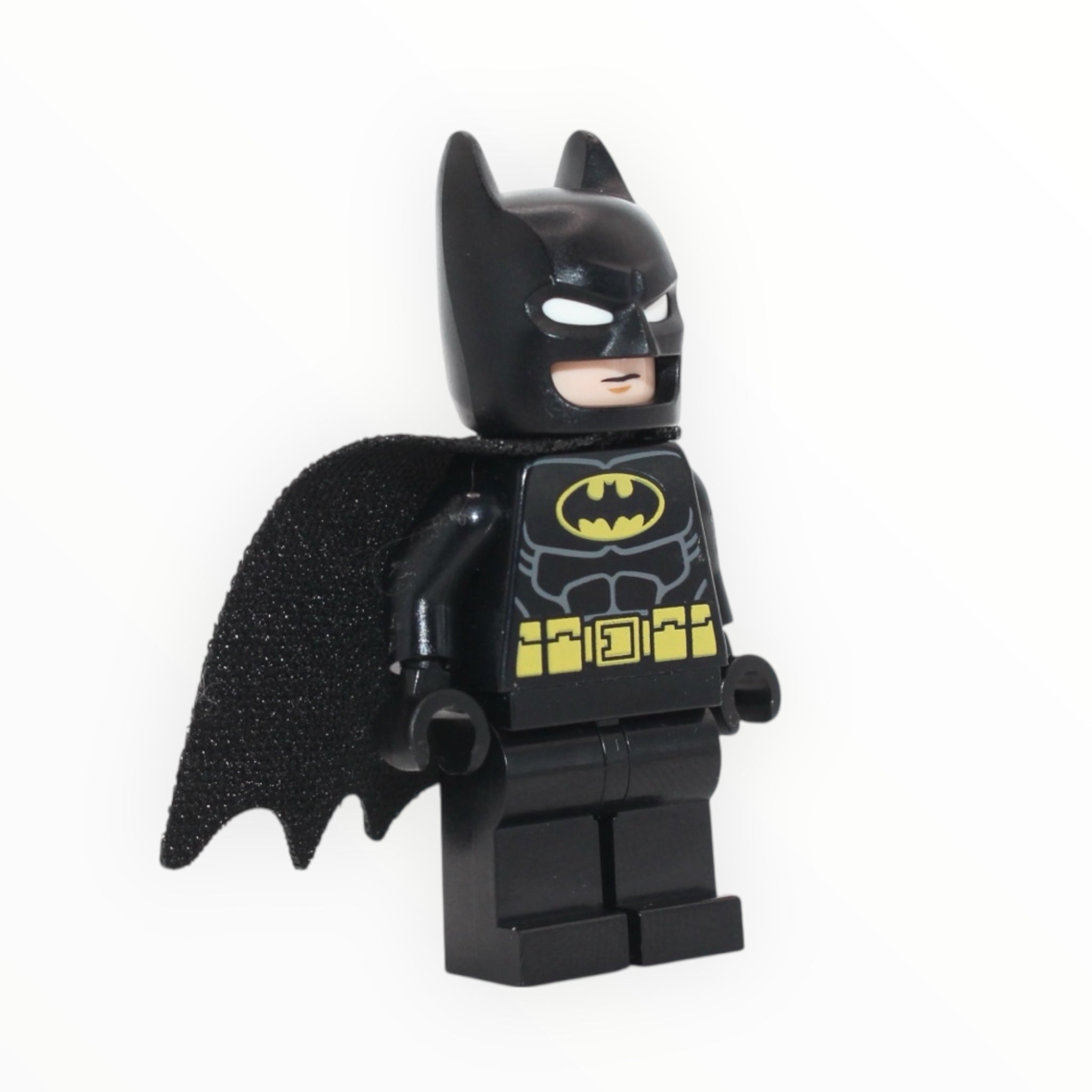 Batman (molded white eyes, black suit, frown, one-hole cape, 2023)