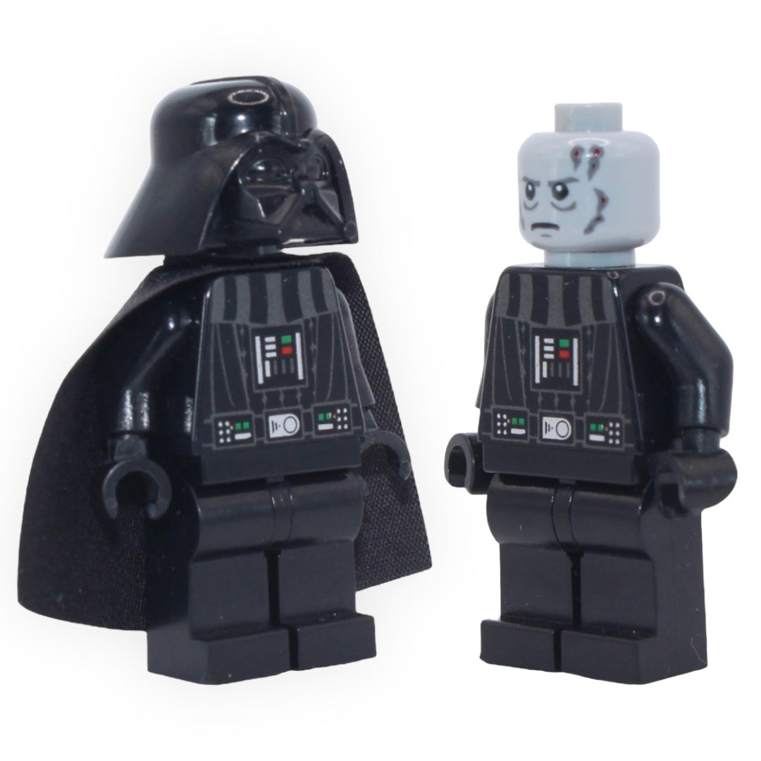 two pieces of luggage sitting on top of a wall