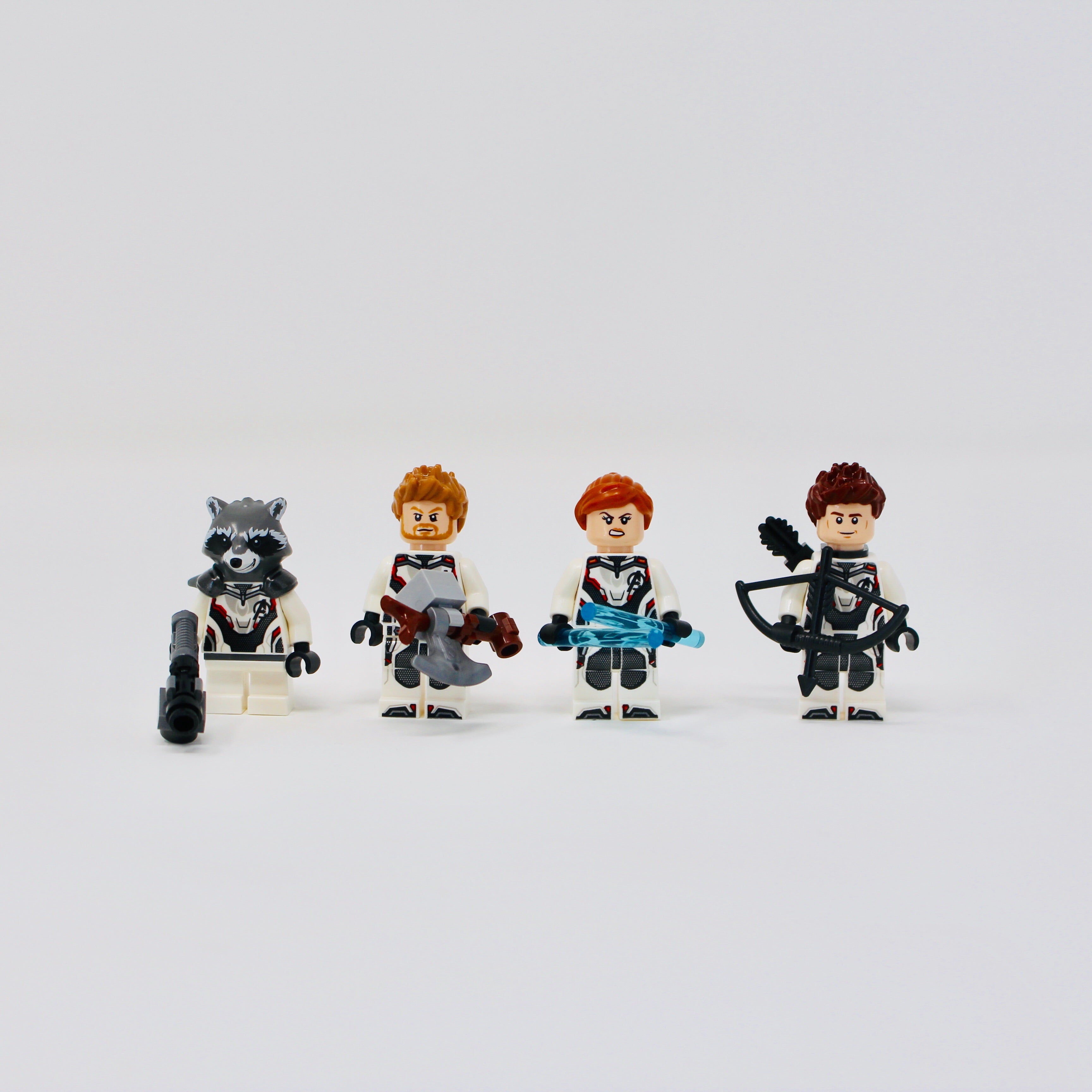 a group of people riding bikes on a snow covered slope