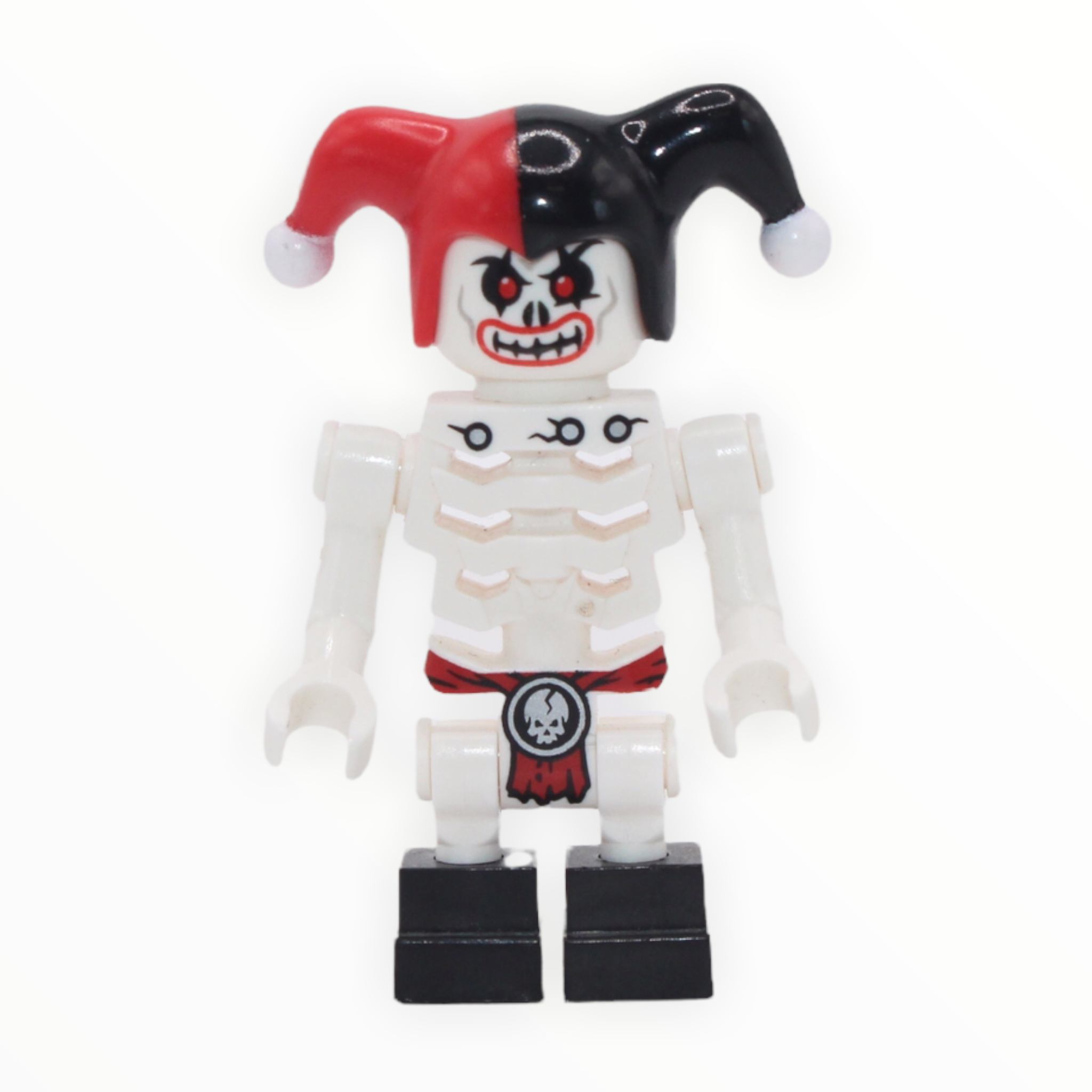 Krazi (black and red cap, red loincloth with medallion)
