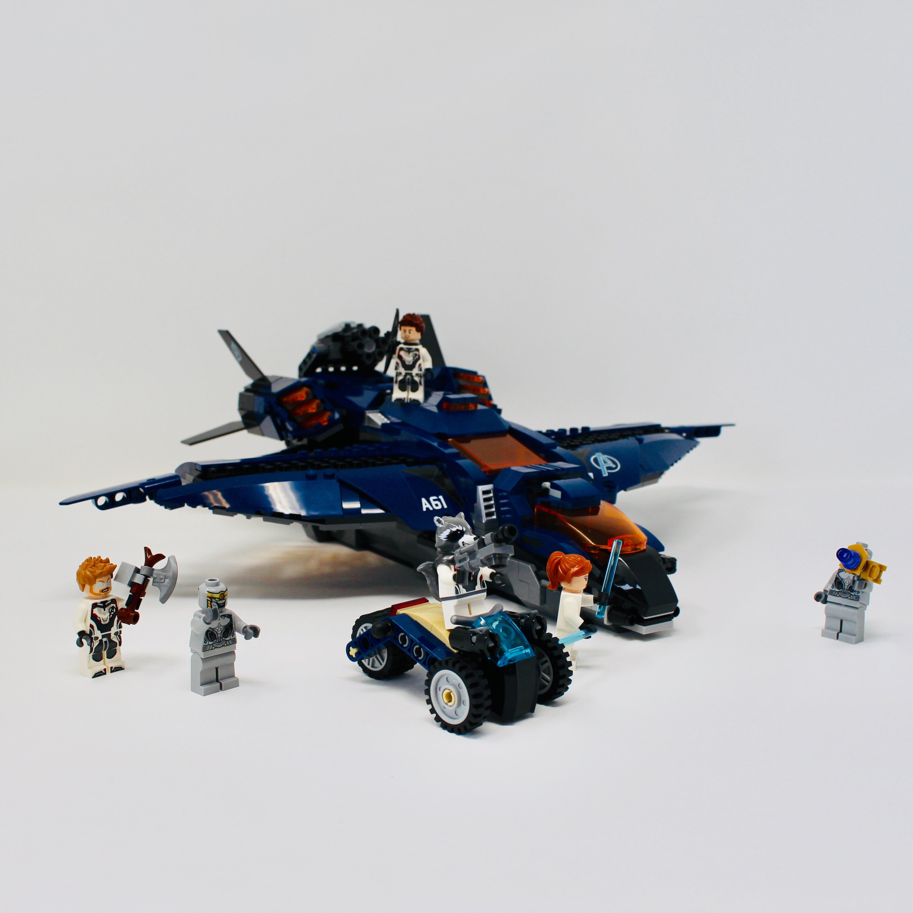 a group of people riding motorcycles in the snow