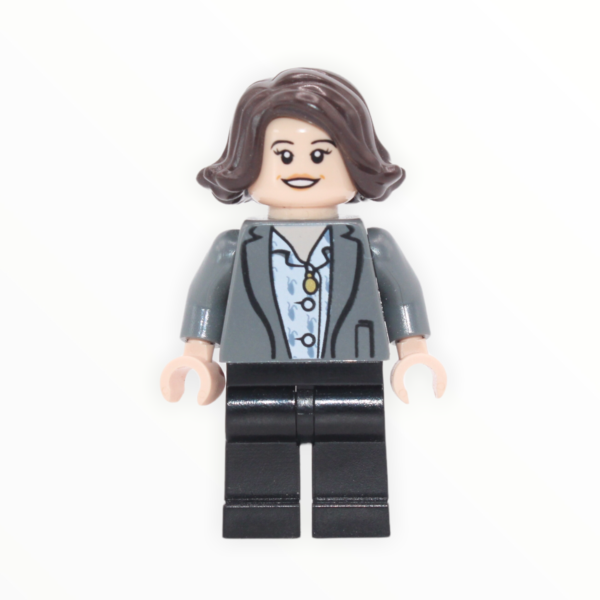 Tina Goldstein (hair, light bluish gray jacket, black legs)