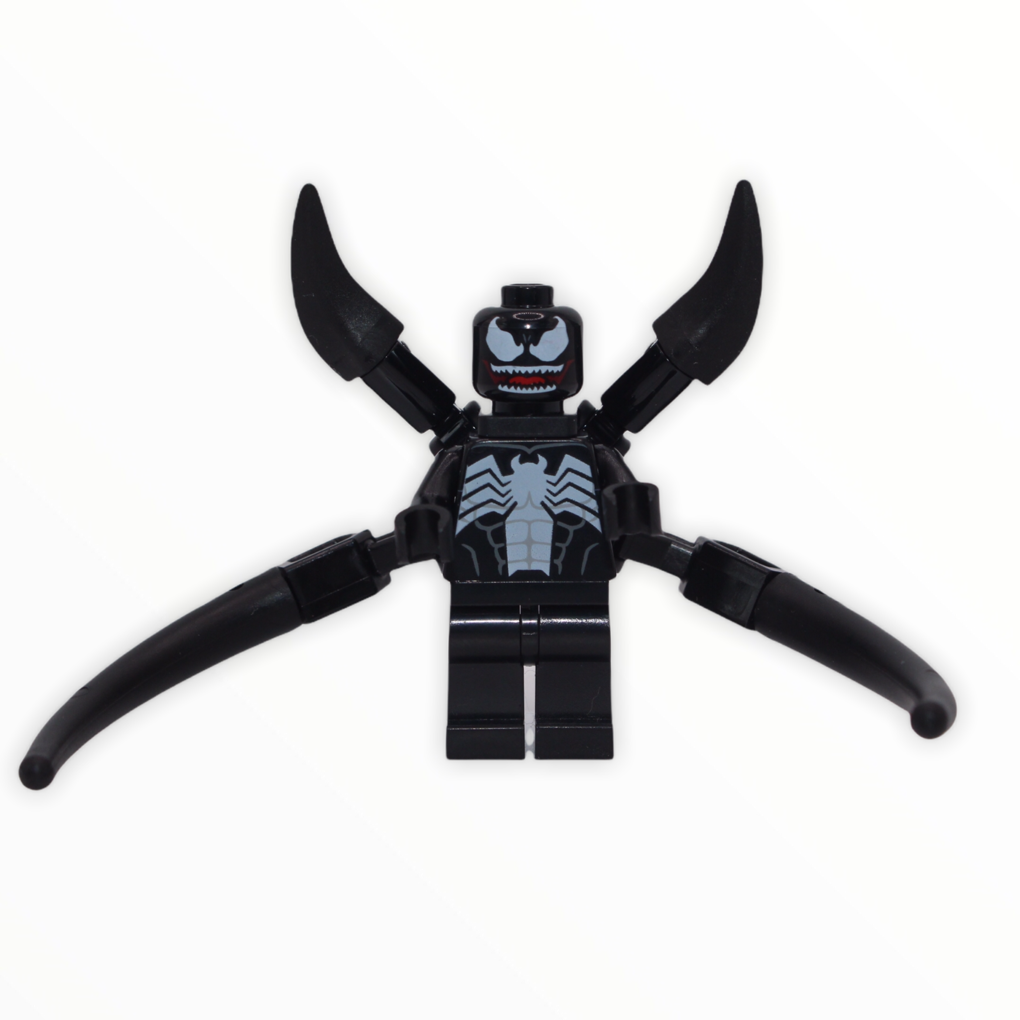 Venom (2 long and 2 short appendages, open mouth)