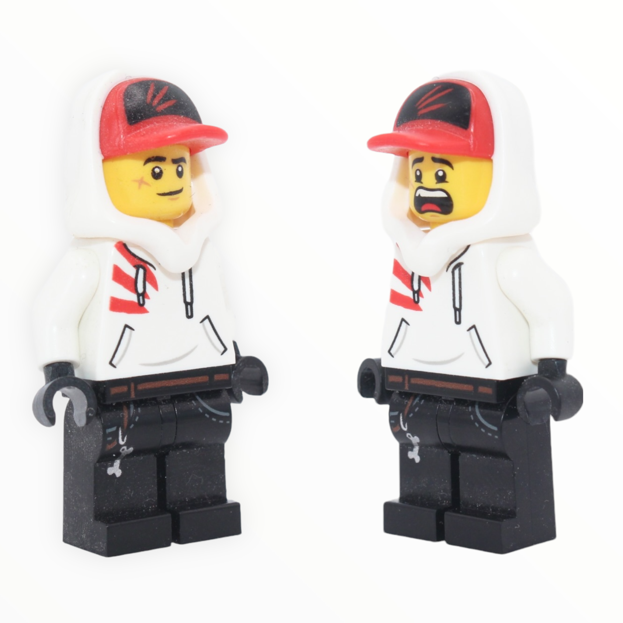 Jack Davids (white hoodie, cap, lopsided smile / scared)