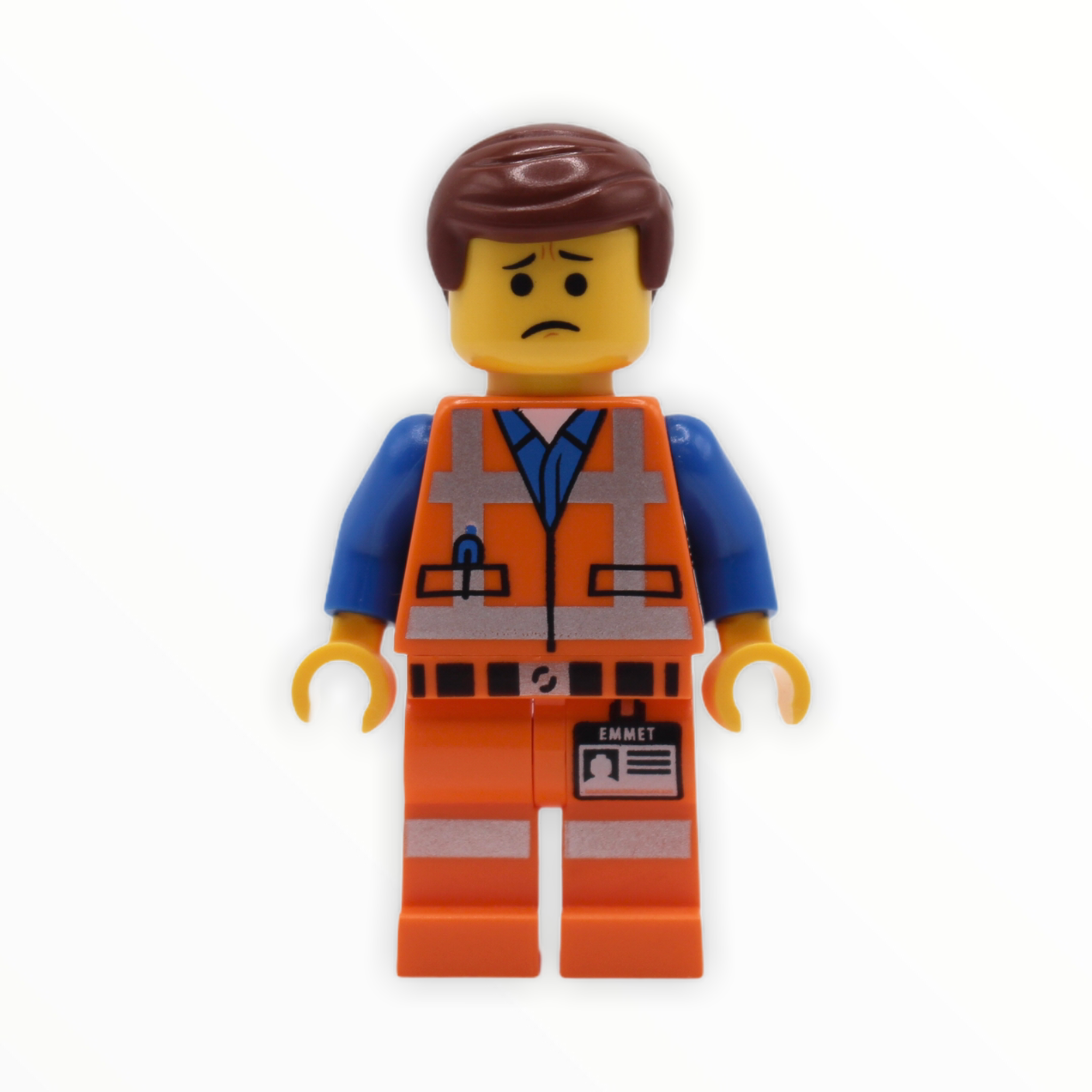 Emmet (pinched eyebrows frown / lopsided smile)