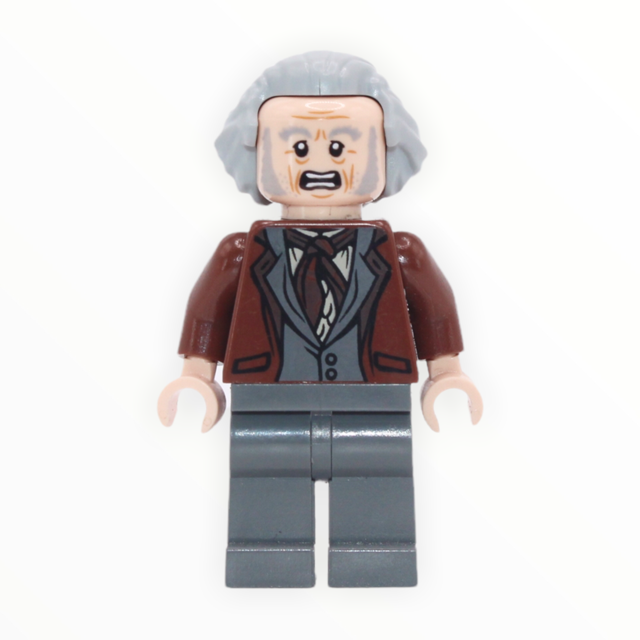 Garrick Ollivander (reddish brown jacket, hair swept back, 2018)