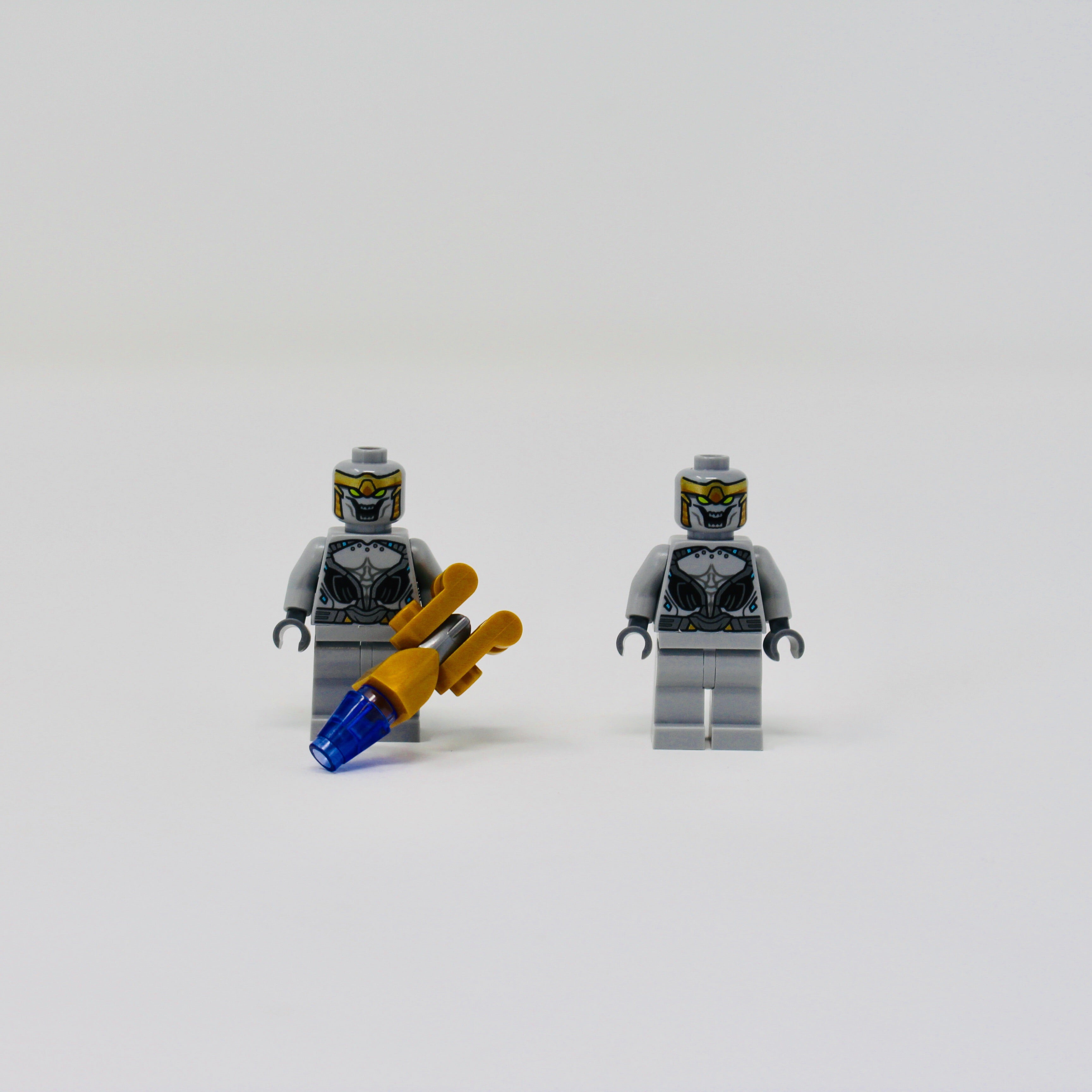 a couple of people riding on top of snow boards