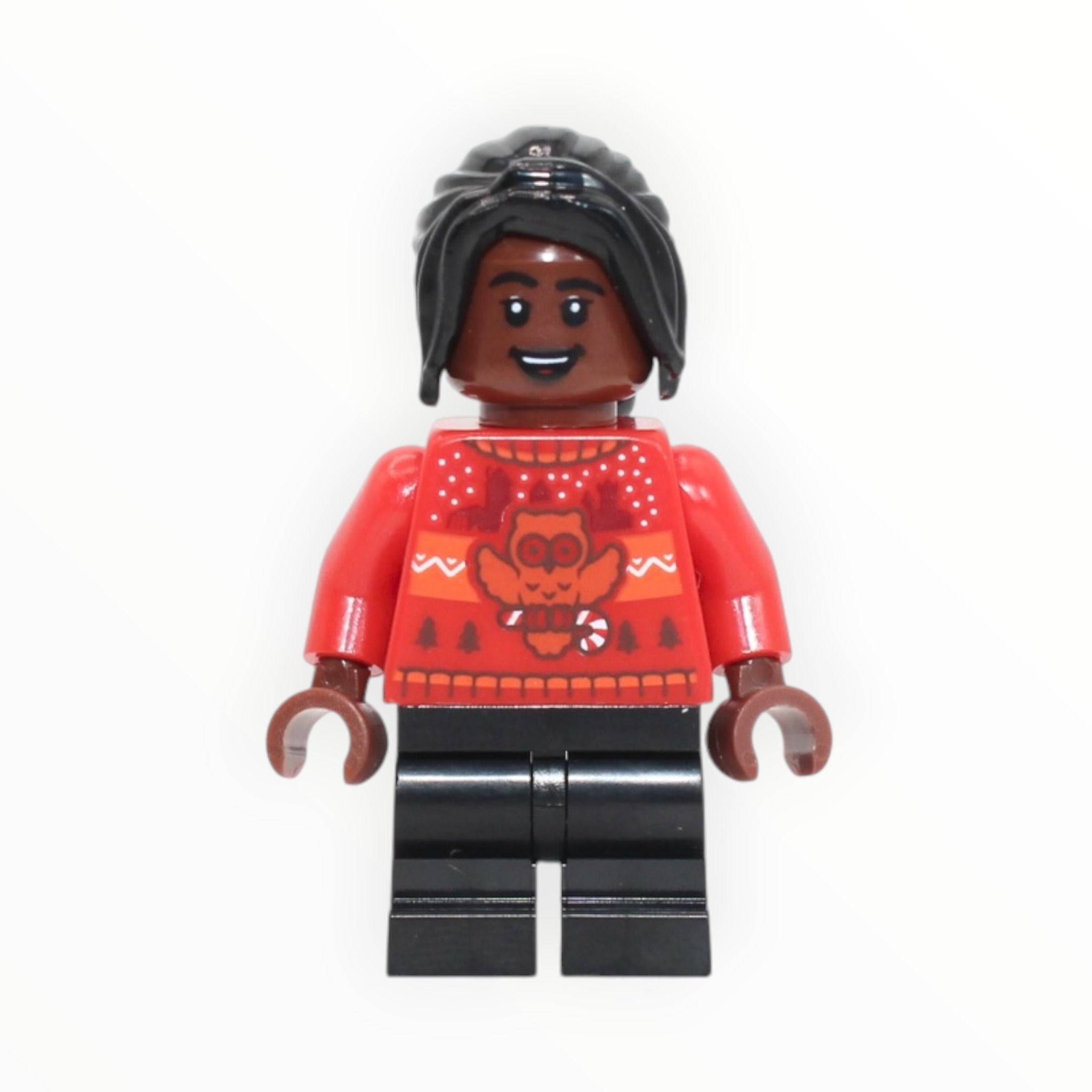 Angelina Johnson (red holiday sweater, 2025)