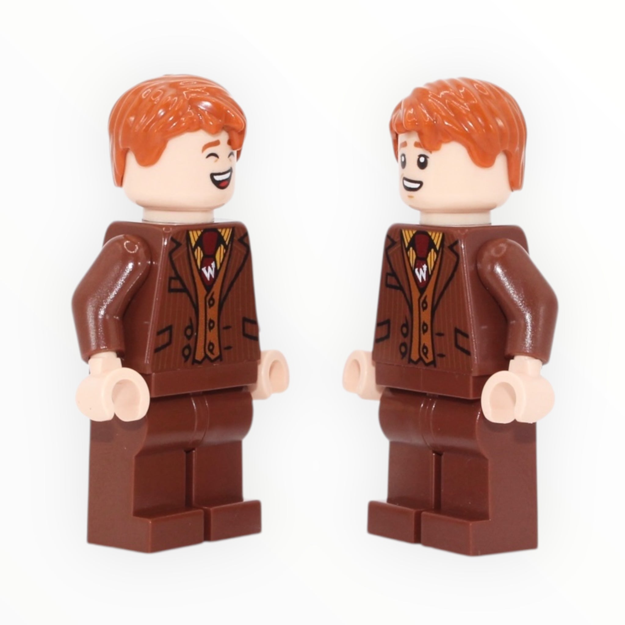 George Weasley (reddish brown suit, orange vest, 2023)