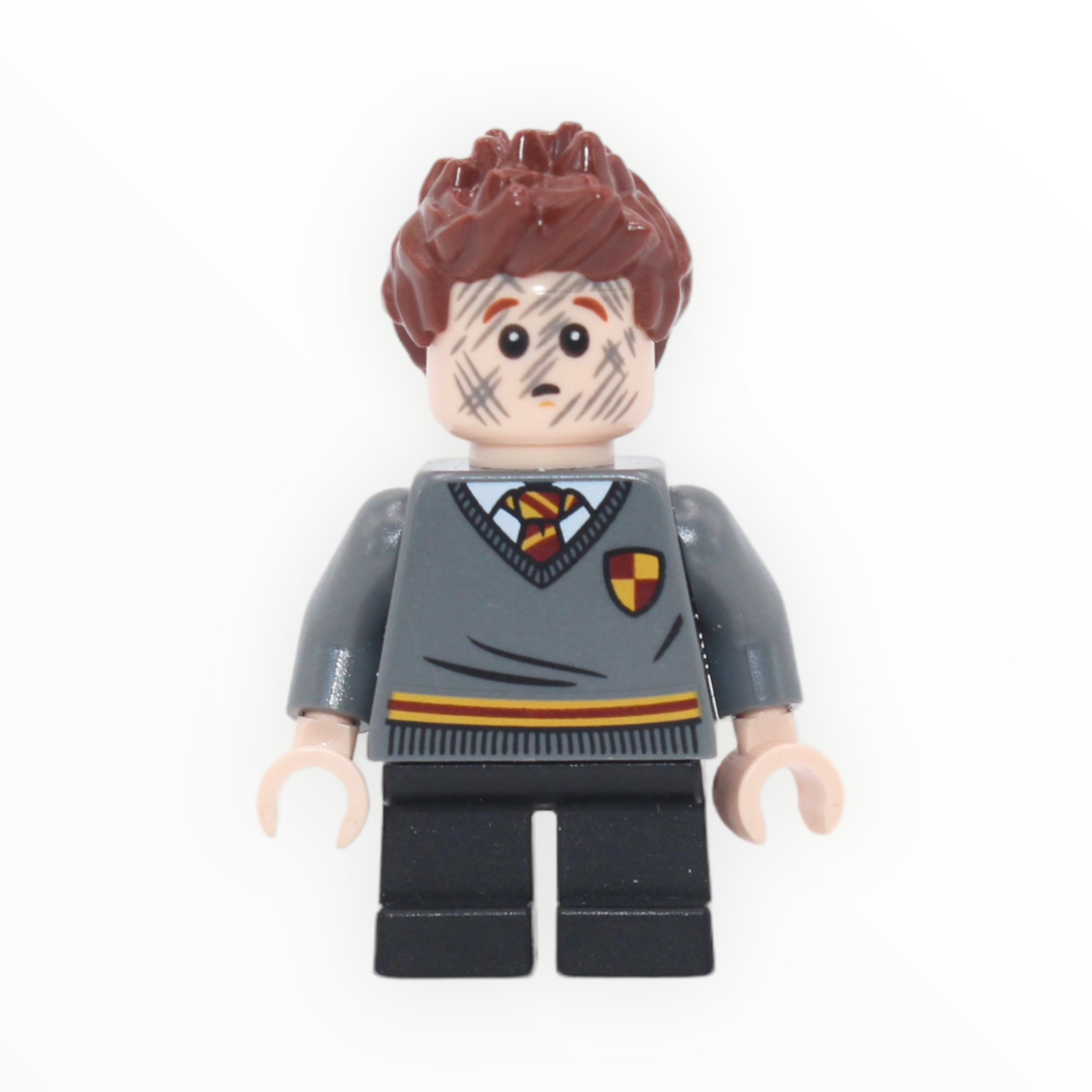 Seamus Finnigan (Gryffindor sweater with crest, dirty face)