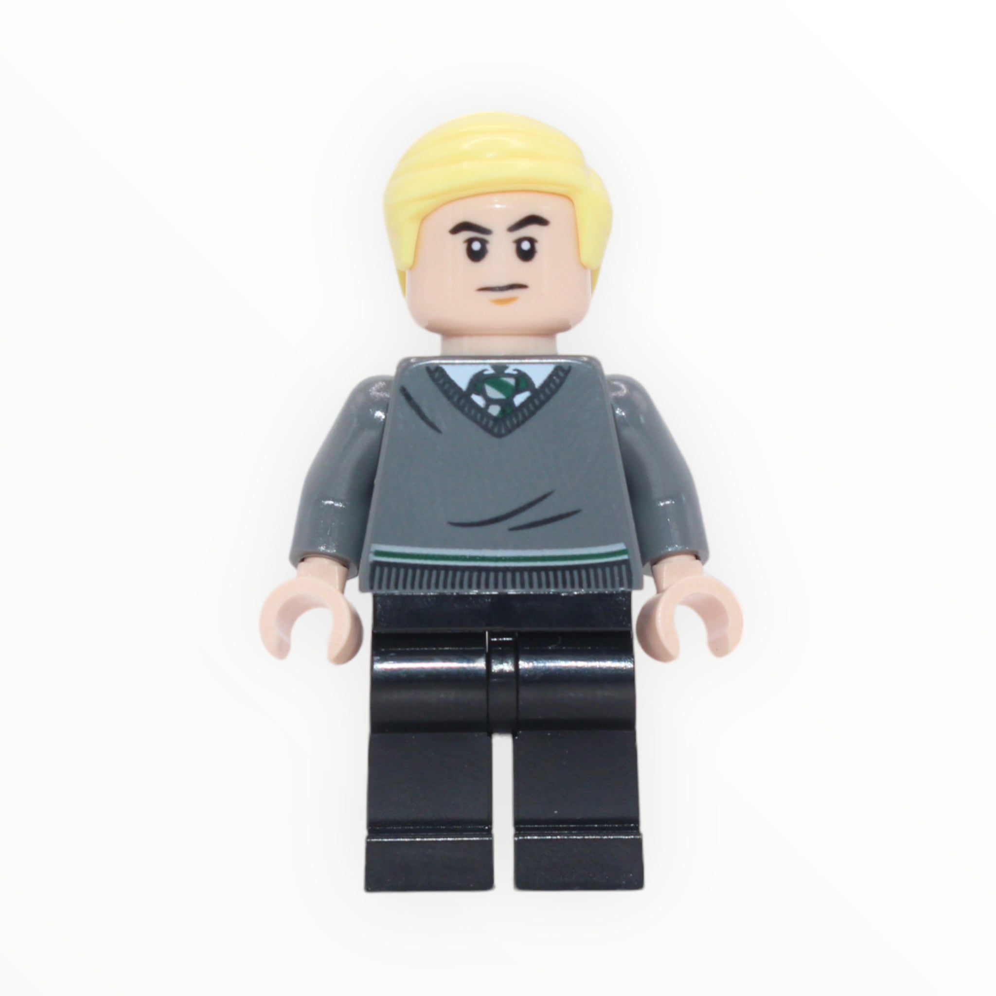 Draco Malfoy (Slytherin sweater, plain black legs)