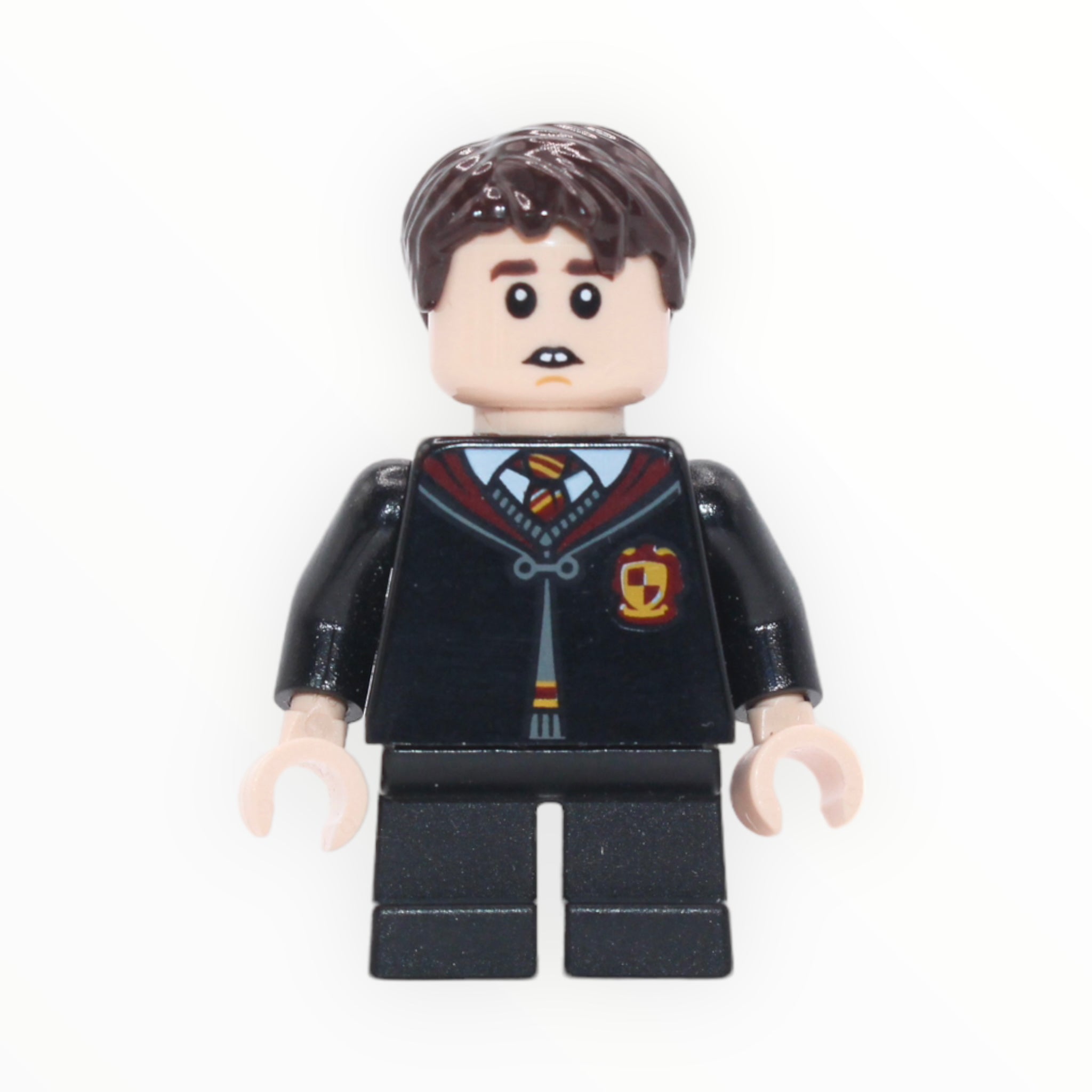 Neville Longbottom (Gryffindor clasped robe, short legs)