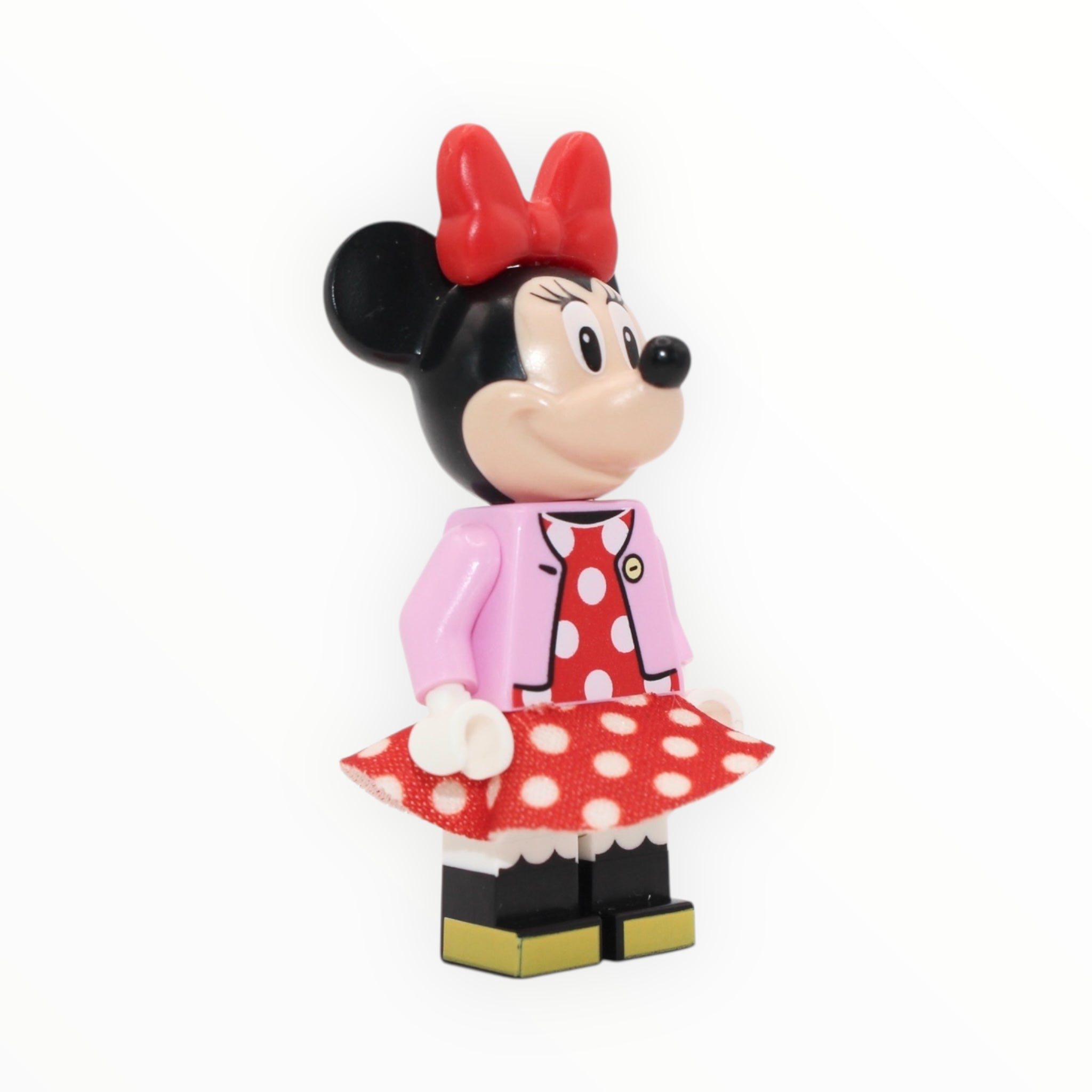 Minnie Mouse (bright pink jacket, cloth skirt, red bow)