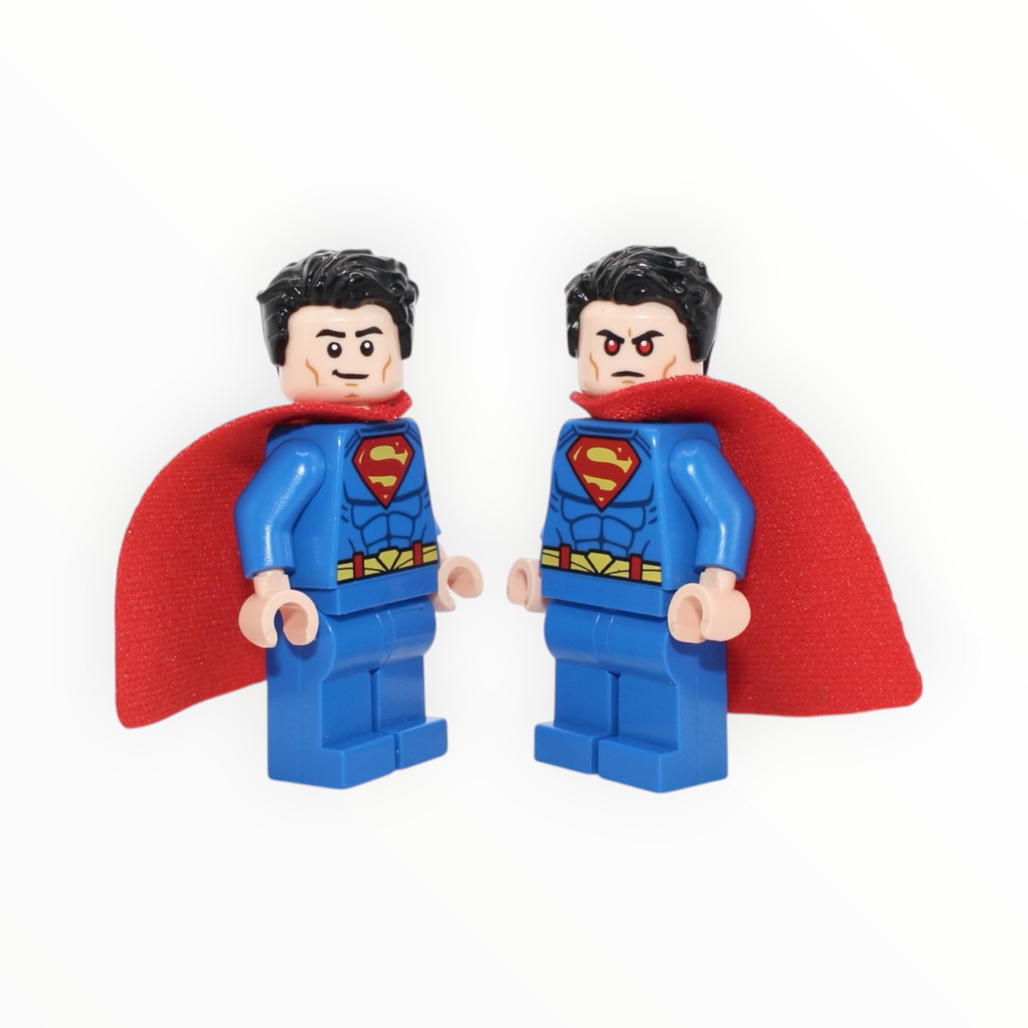 Superman (single-hole cape, closed mouth smile / red eyes, 2025)