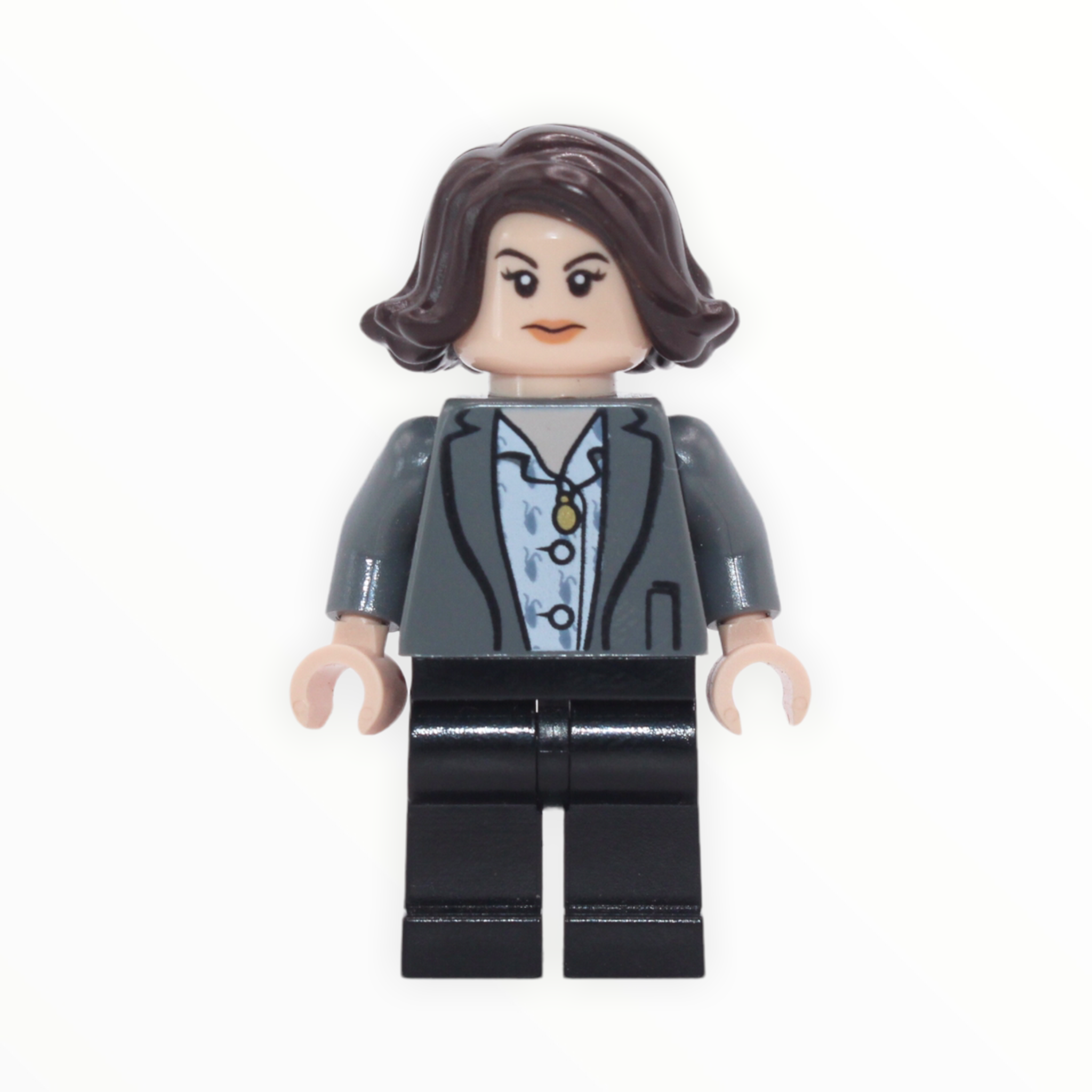 Tina Goldstein (hair, light bluish gray jacket, black legs)